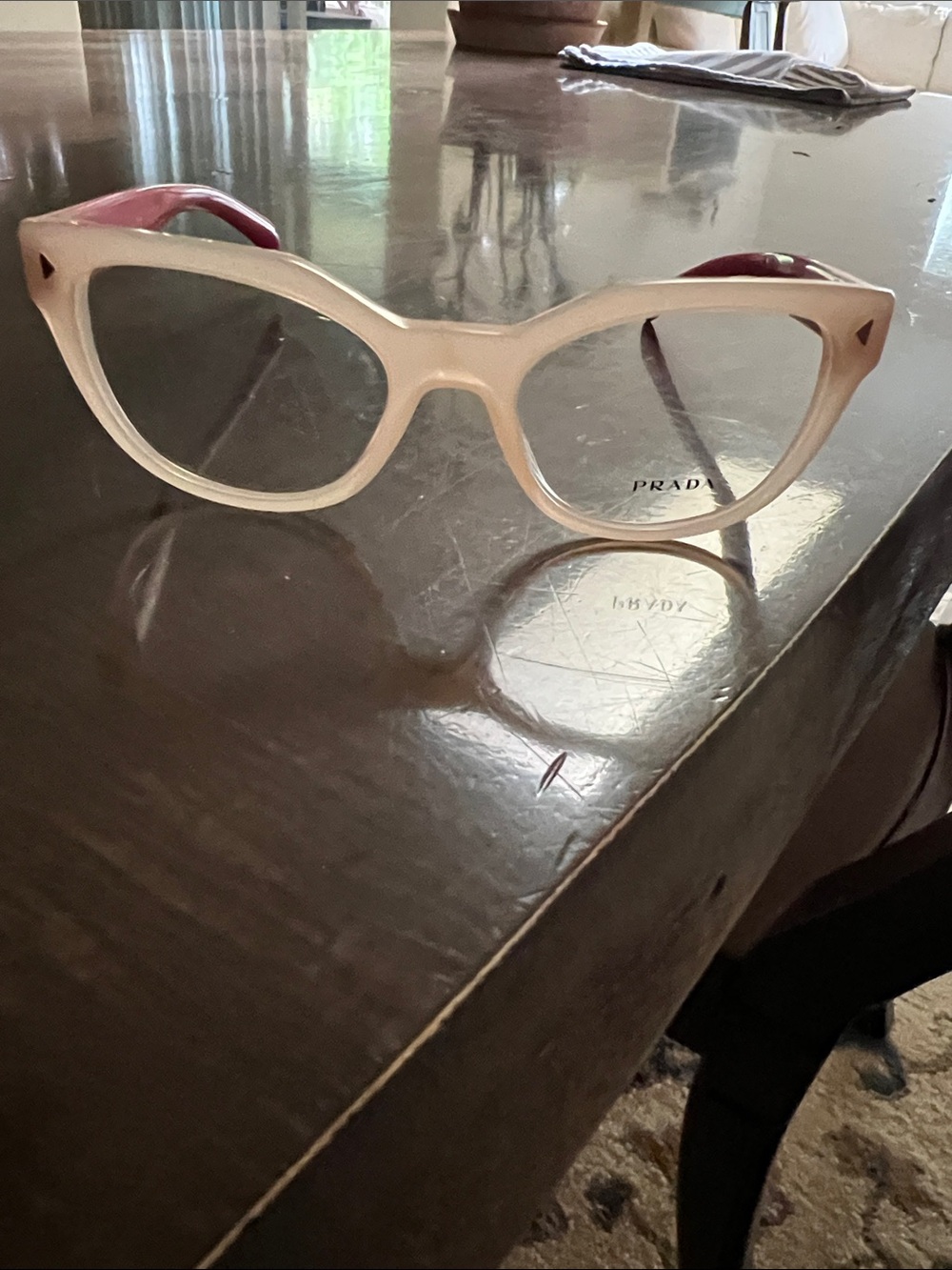 Prada Cream Cat-Eye Glasses with Pink Temples and Clear Lenses
